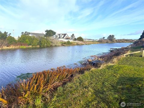 Photo of 555 Canal Drive NE, Ocean Shores, WA 98569 (MLS # 2490338)