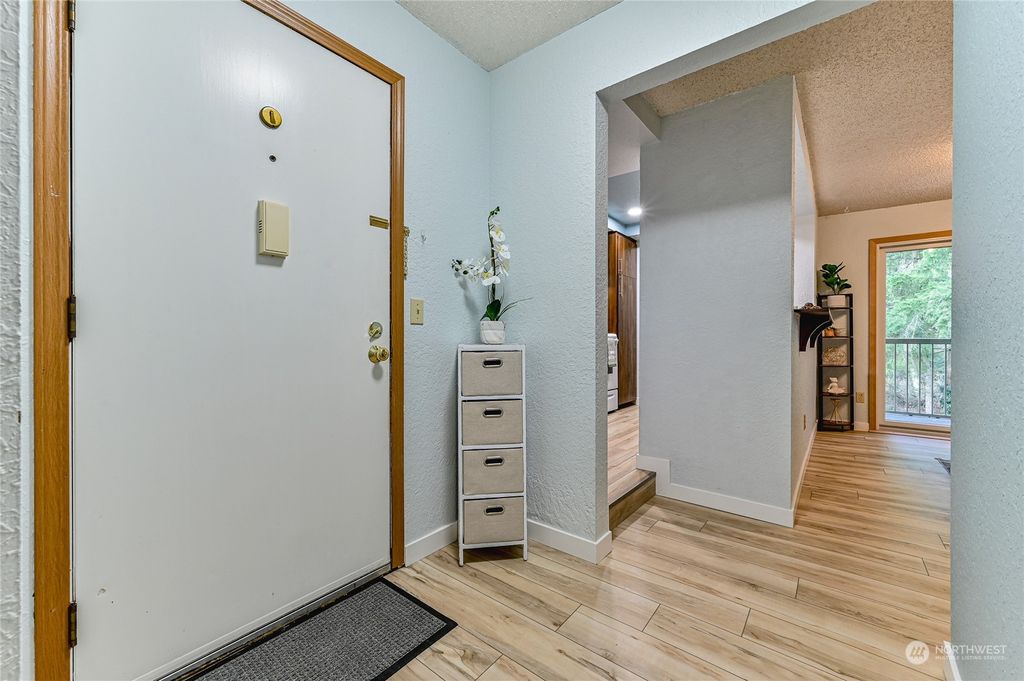 Photo of 14401 SE Petrovitsky Road #E-105, Renton, WA 98058 (MLS # 2040732)