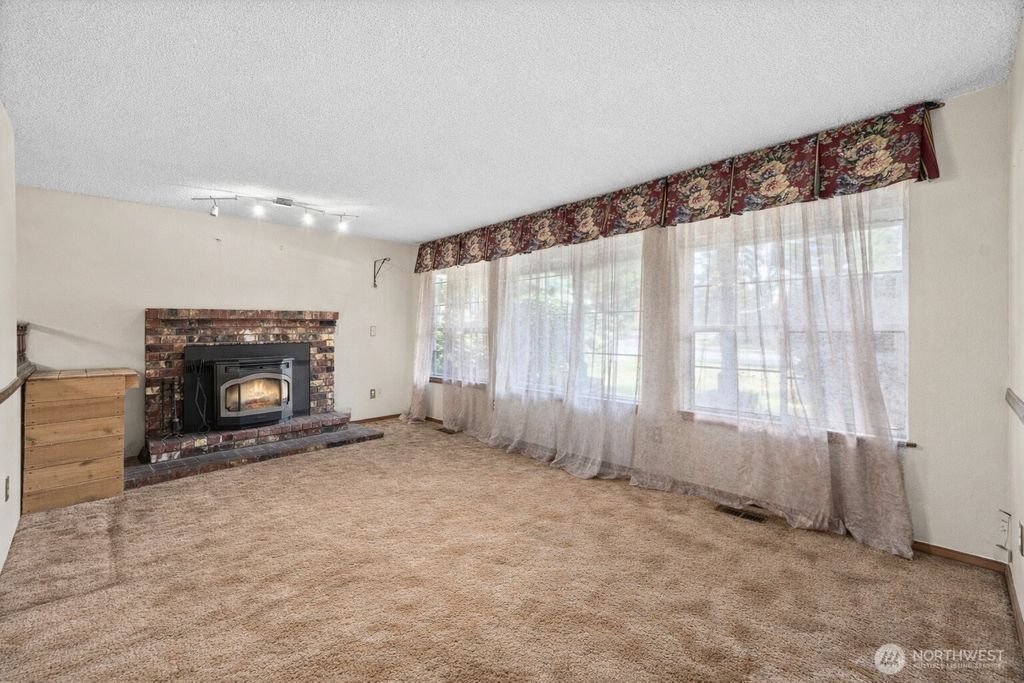 Photo of 15220 118th Avenue Ct E, Puyallup, WA 98374 (MLS # 2491543)