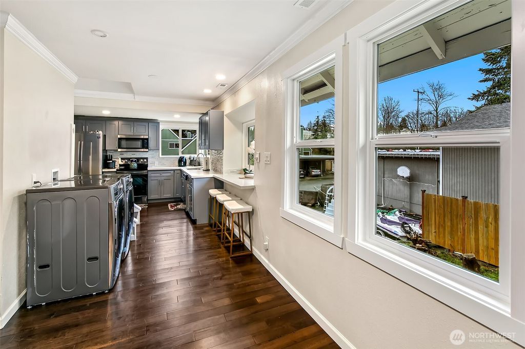 Photo of 8405 24th Avenue SW, Seattle, WA 98106 (MLS # 2440856)