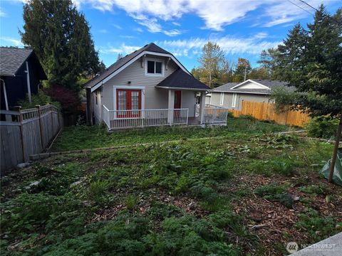 Photo of 8405 24th Avenue SW, Seattle, WA 98106 (MLS # 2440856)