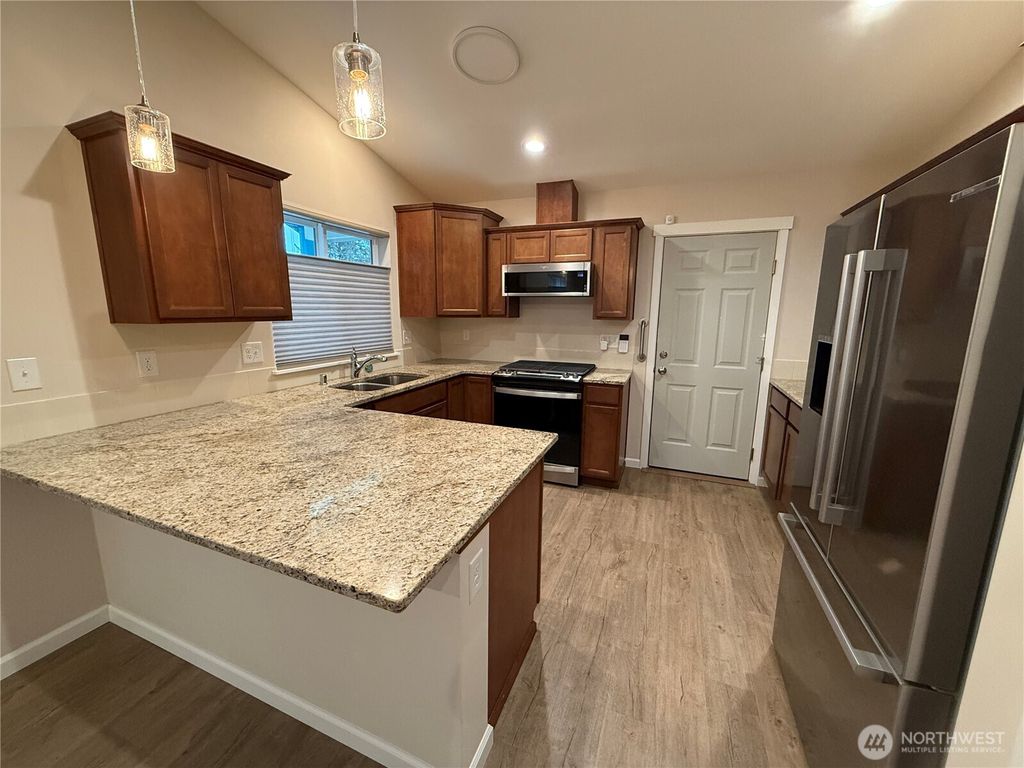 Photo of 312 Pearsall Street SE, Ocean Shores, WA 98569 (MLS # 2471132)