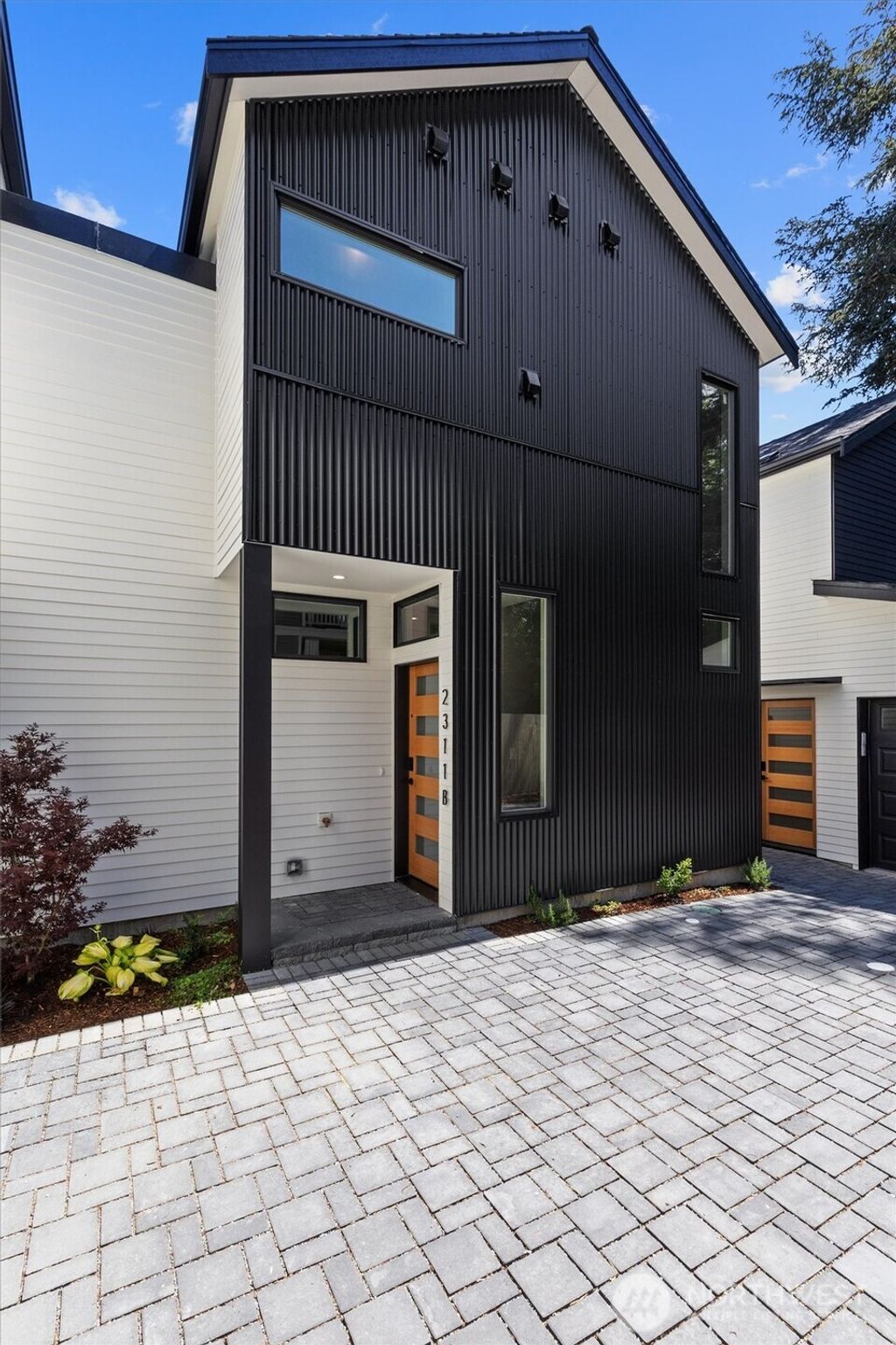 Photo of 2311 N 135th Street #B, Seattle, WA 98133 (MLS # 2405736)
