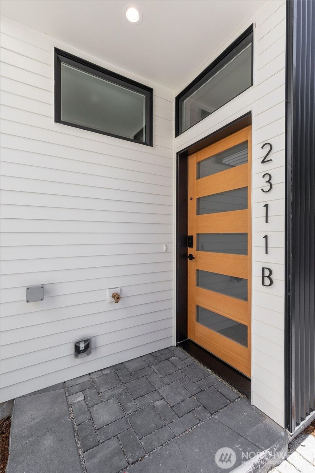 Photo of 2311 N 135th Street #B, Seattle, WA 98133 (MLS # 2405736)