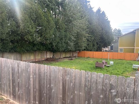 Photo of 9725 S 244th Place, Kent, WA 98030 (MLS # 2472306)