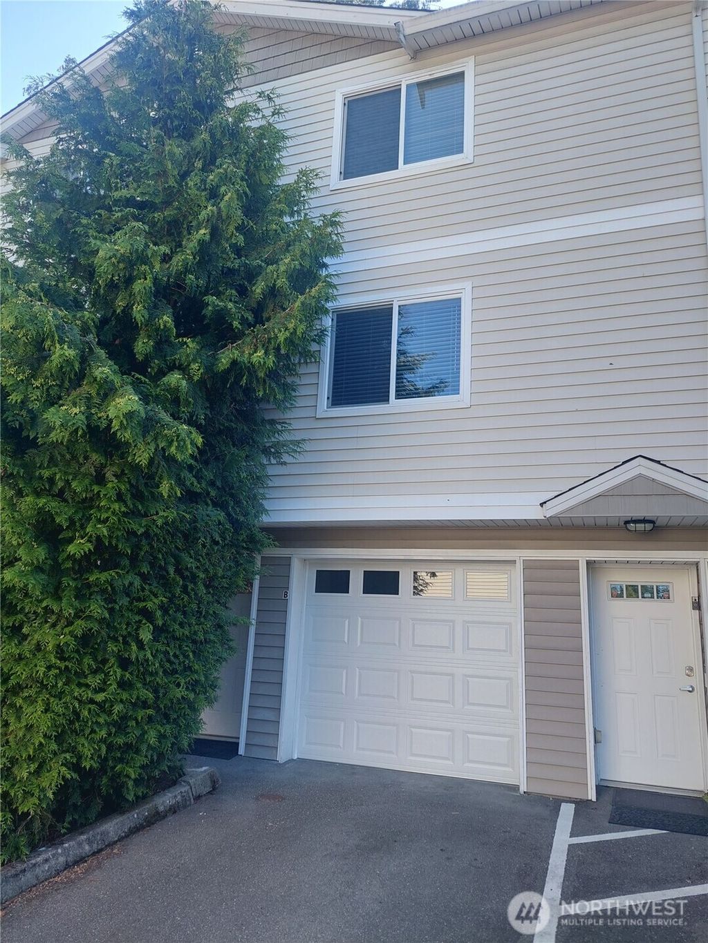 Photo of 6907 Rainier Drive E #1B, Everett, WA 98203 (MLS # 2401199)