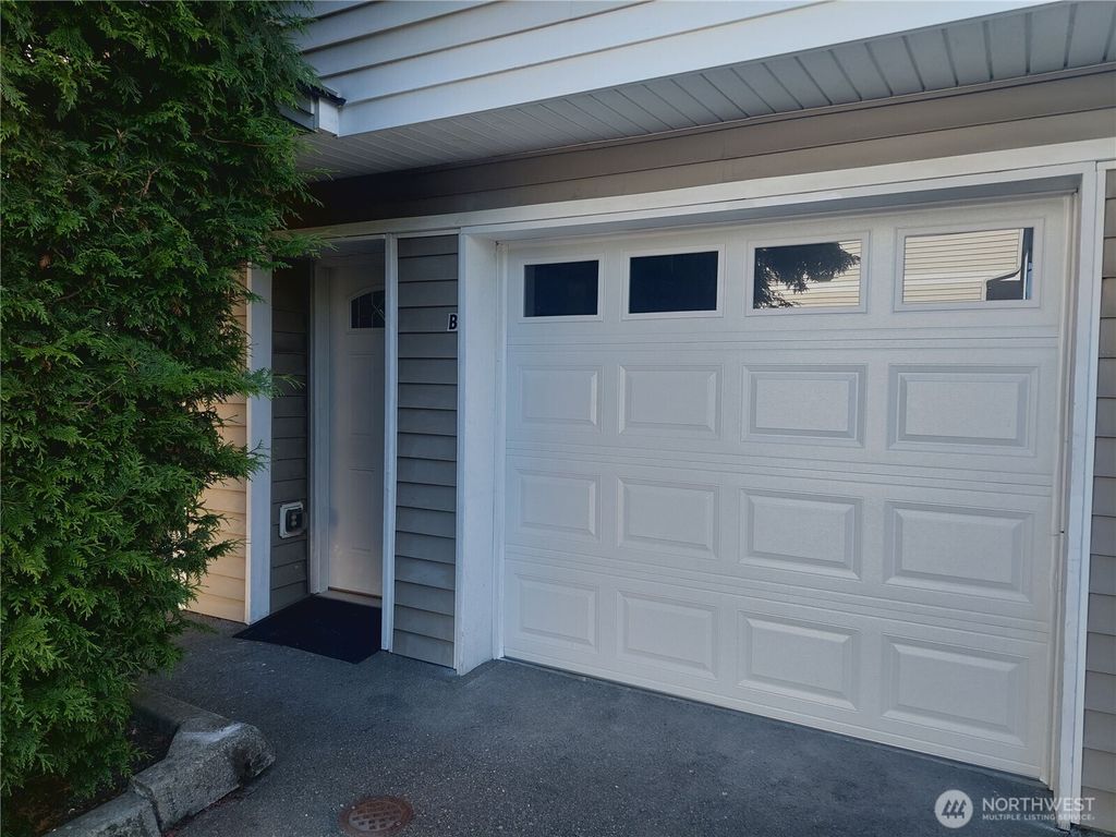Photo of 6907 Rainier Drive E #1B, Everett, WA 98203 (MLS # 2401199)