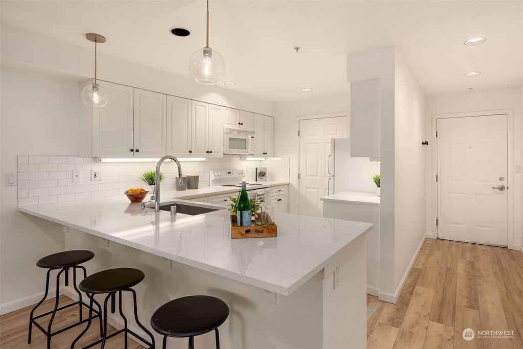 Photo of 6300 32nd Avenue NW #203, Seattle, WA 98107 (MLS # 2218287)