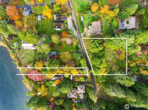 Photo of 9674 Olympus Beach Road, Bainbridge Island, WA 98110 (MLS # 2456085)