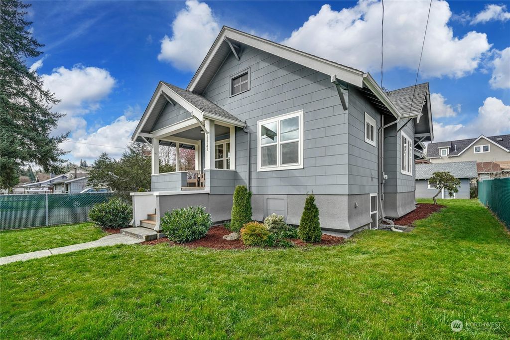 Photo of 11745 87th Avenue S, Seattle, WA 98178 (MLS # 2214401)