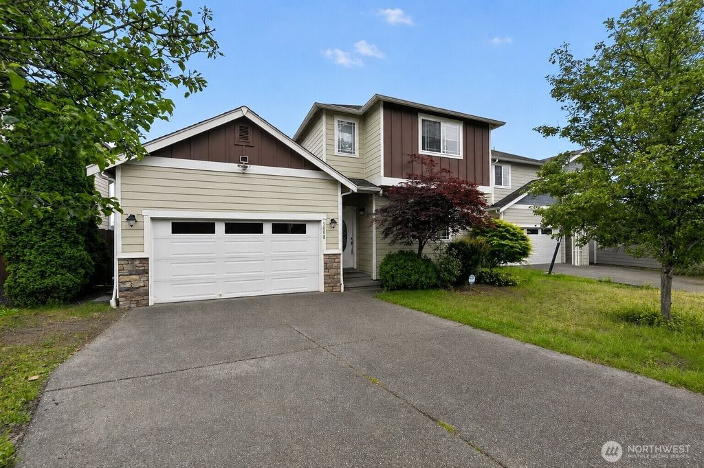 Photo of 5007 NE 6th Street, Renton, WA 98059 (MLS # 2529176)