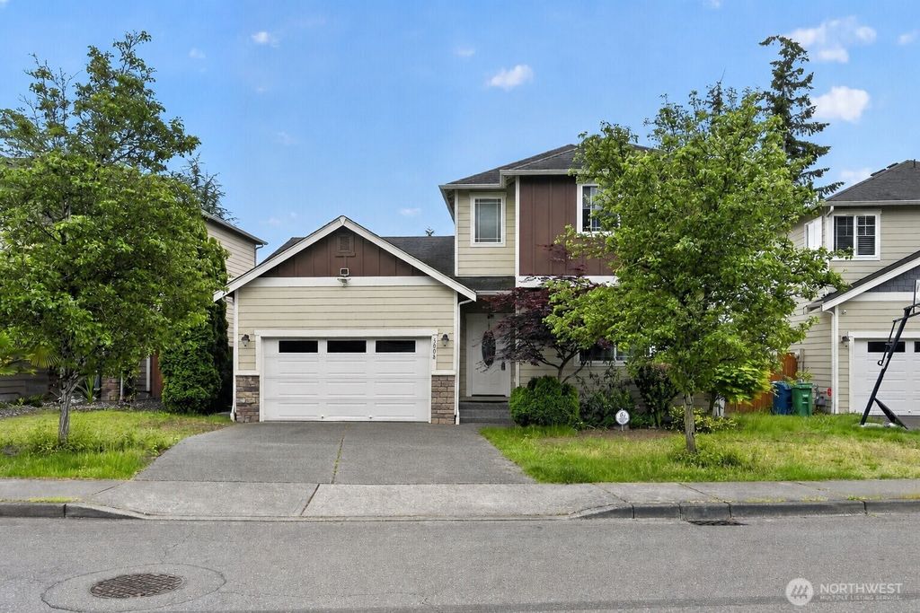 Photo of 5007 NE 6th Street, Renton, WA 98059 (MLS # 2529176)