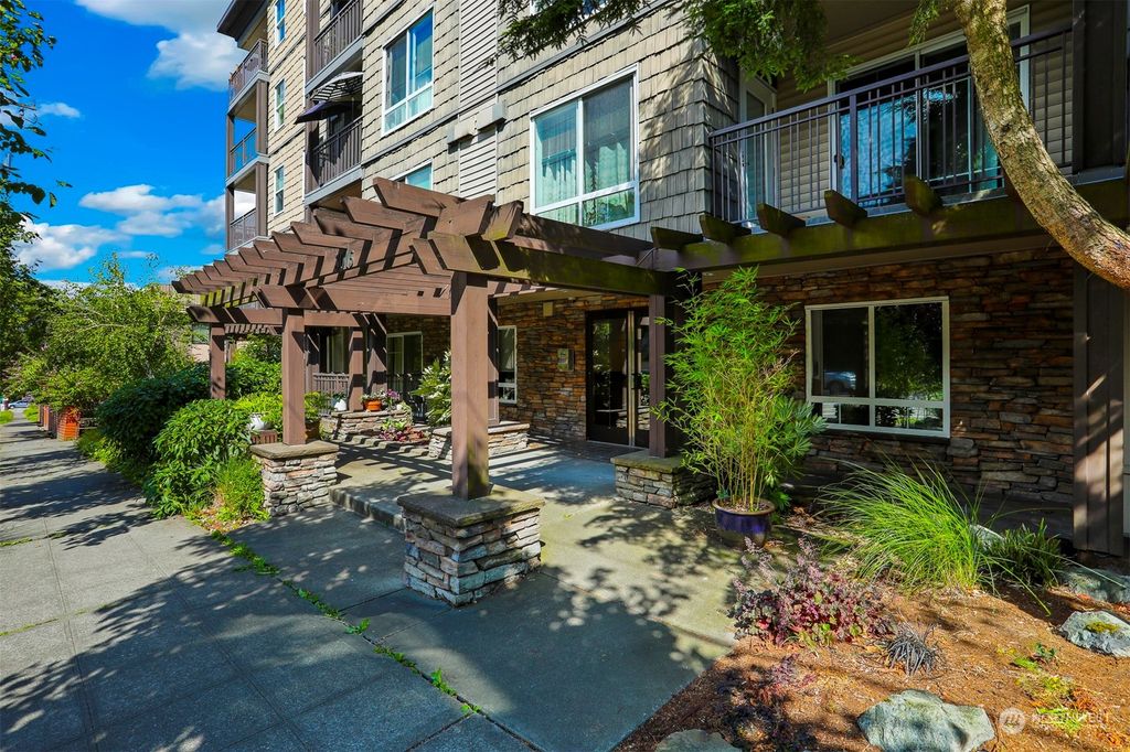 Photo of 3015 SW Avalon Way #209, Seattle, WA 98126 (MLS # 2144593)