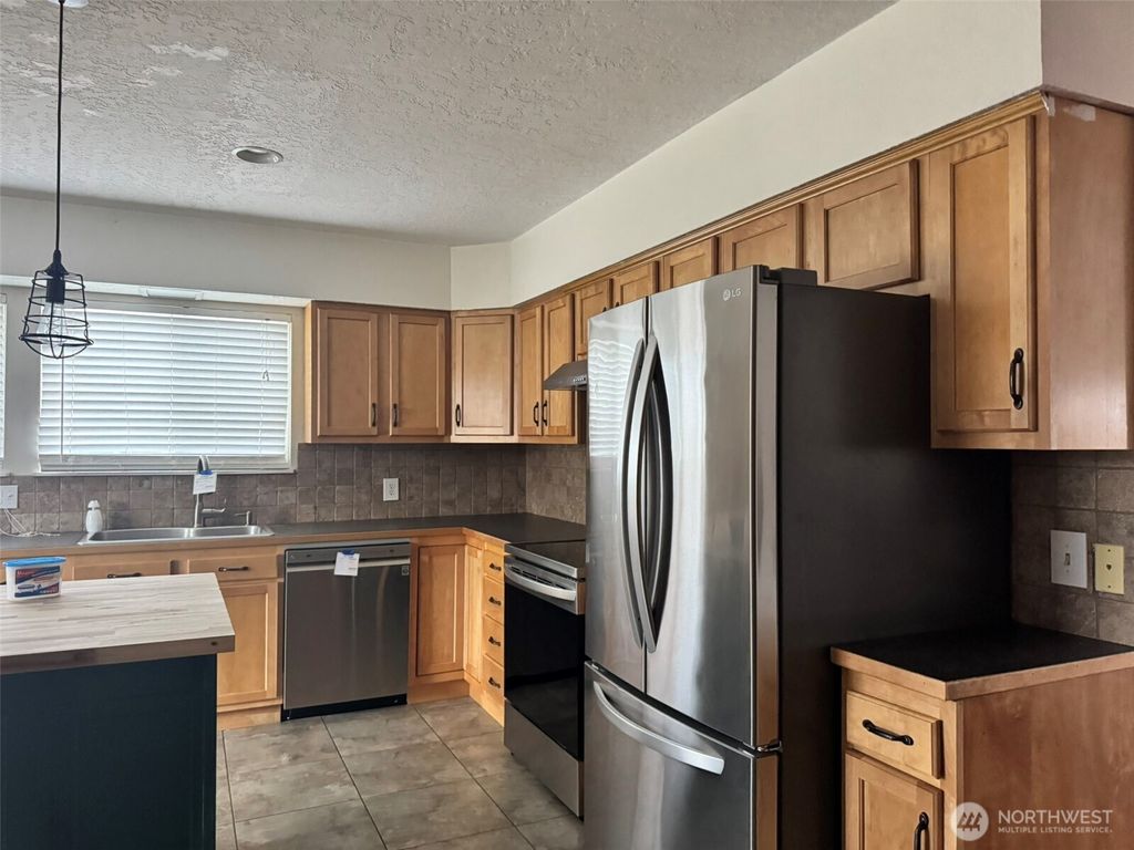 Photo of 21 Orchard Loop Road N, Tonasket, WA 98855 (MLS # 2489097)