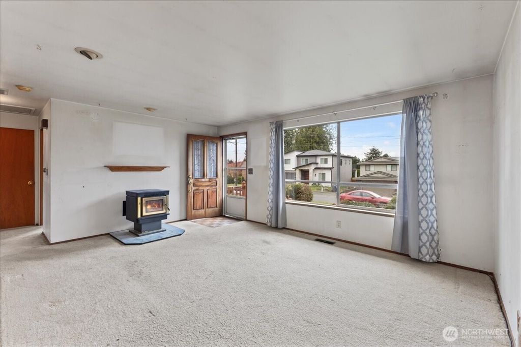 Photo of 3734 S 192nd Street, SeaTac, WA 98188 (MLS # 2354130)