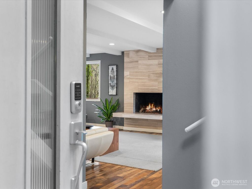 Photo of 11404 8th Avenue NW, Seattle, WA 98177 (MLS # 2495064)