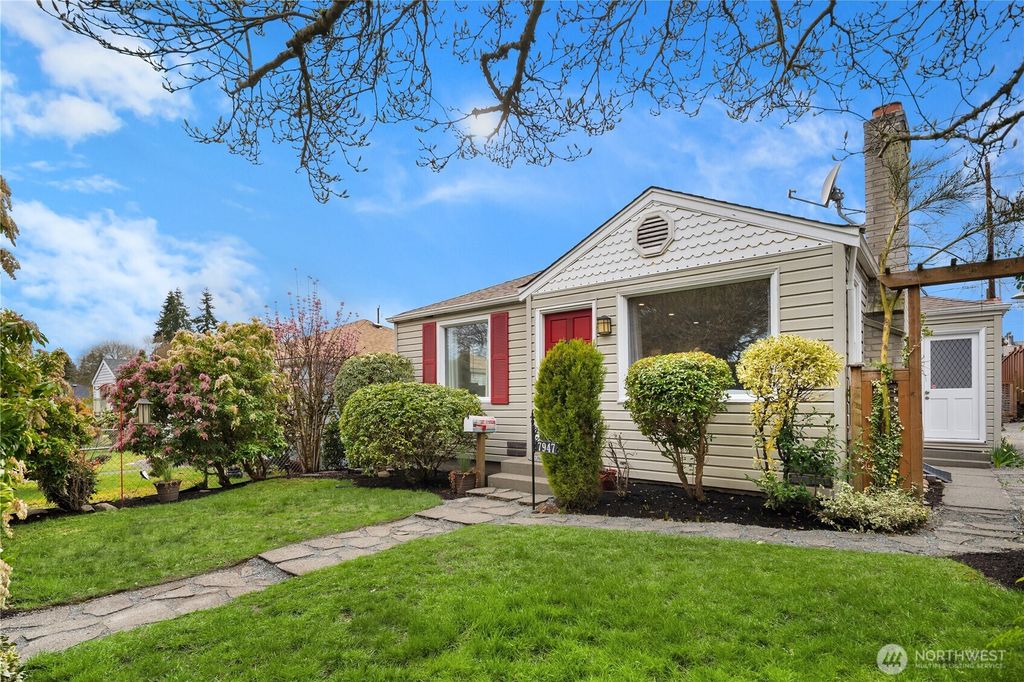 Photo of 7947 31st Avenue SW, Seattle, WA 98126 (MLS # 2333337)