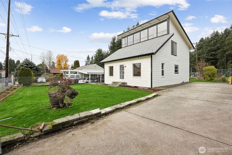 Photo of 2225 E 64th Street, Tacoma, WA 98404 (MLS # 2456867)