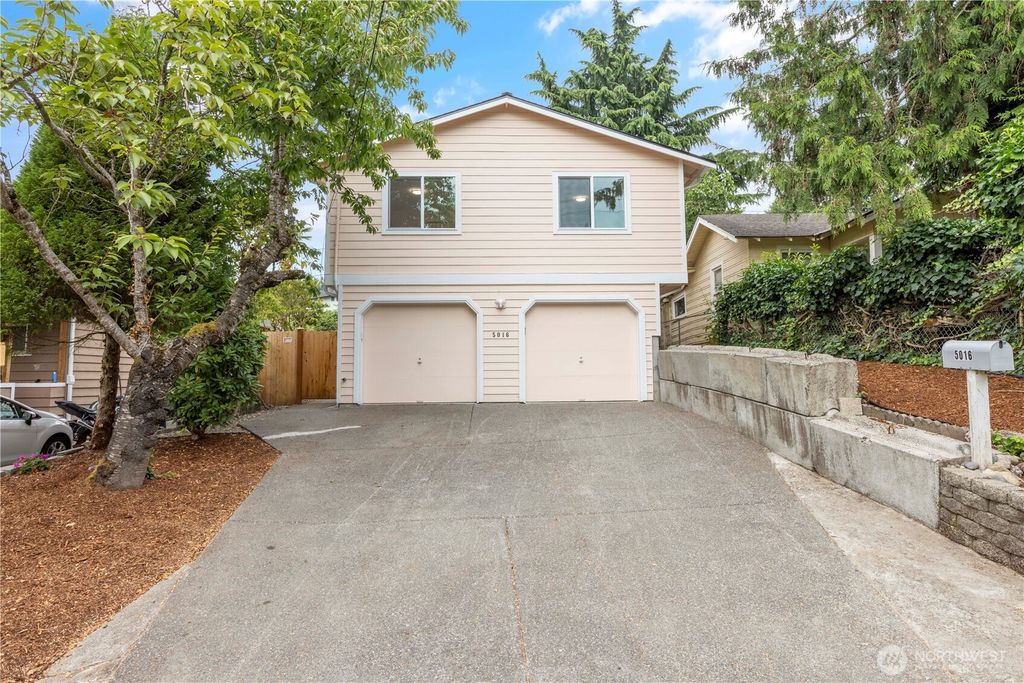 Photo of 5016 26th Avenue SW, Seattle, WA 98106 (MLS # 2559631)