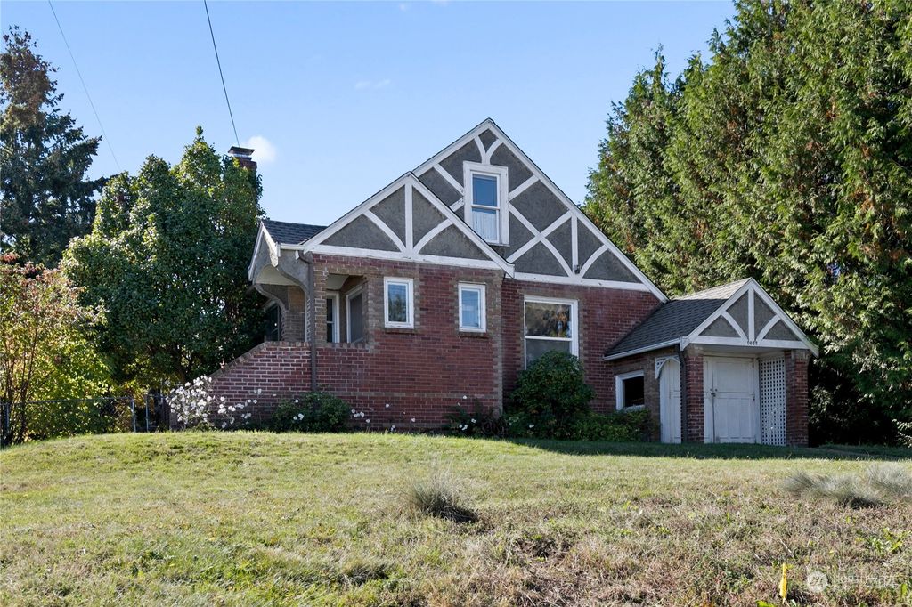 Photo of 1055 S 100th Street, Seattle, WA 98168 (MLS # 2296576)