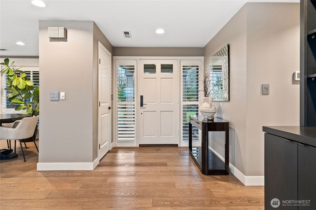 Photo of 9829 Hilltop Road, Bellevue, WA 98004 (MLS # 2476187)