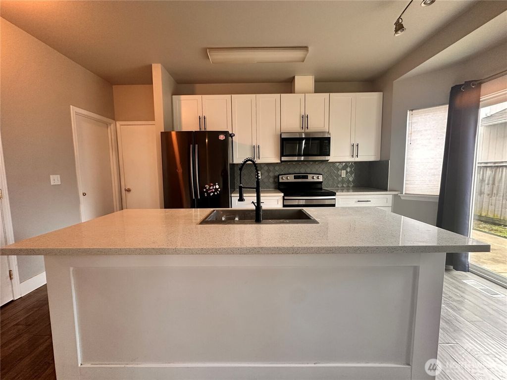 Photo of 6451 STEAMER DR SE Dr, Lacey, WA 98513 (MLS # 2463803)