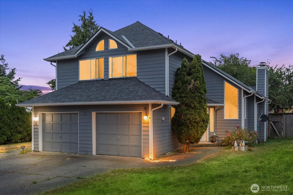 Photo of 2826 NE 8th Street, Renton, WA 98056 (MLS # 2404141)