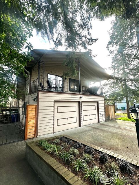 Photo of 12544 25th Avenue SE, Seattle, WA 98125 (MLS # 2521679)