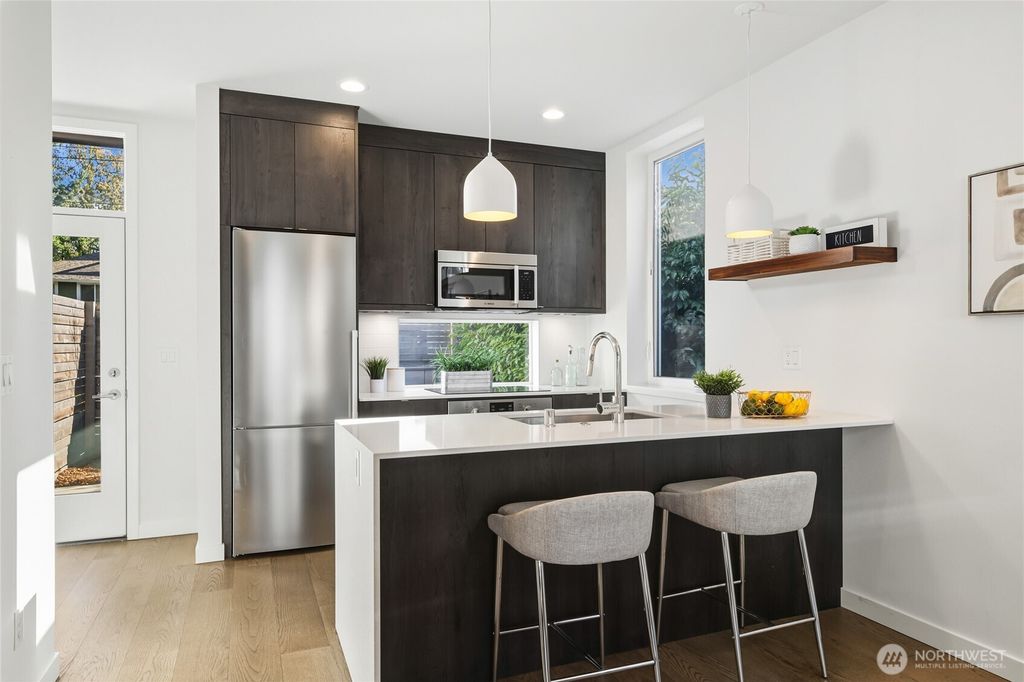 Photo of 6712 36th Avenue SW, Seattle, WA 98126 (MLS # 2477934)