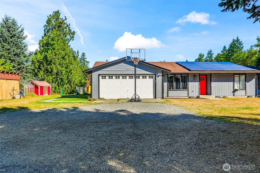 Photo of 13007 Kapowsin Highway E, Graham, WA 98338 (MLS # 2582436)