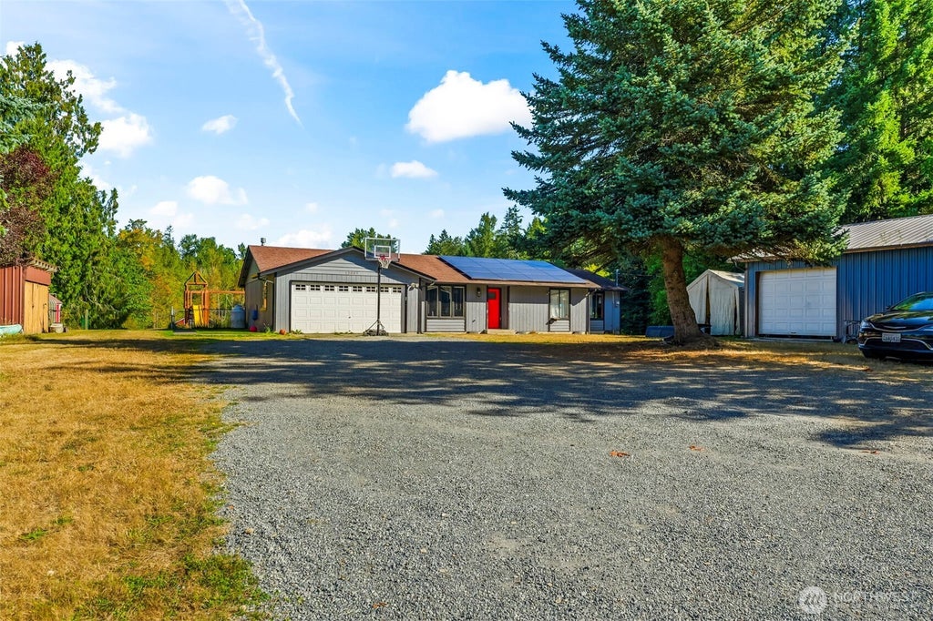 Photo of 13007 Kapowsin Highway E, Graham, WA 98338 (MLS # 2582436)