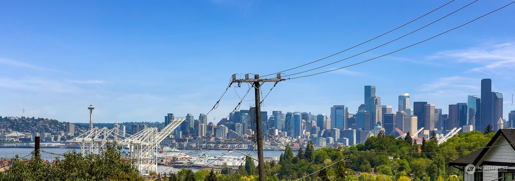 Photo of 5655 30th Avenue SW, Seattle, WA 98126 (MLS # 2234183)