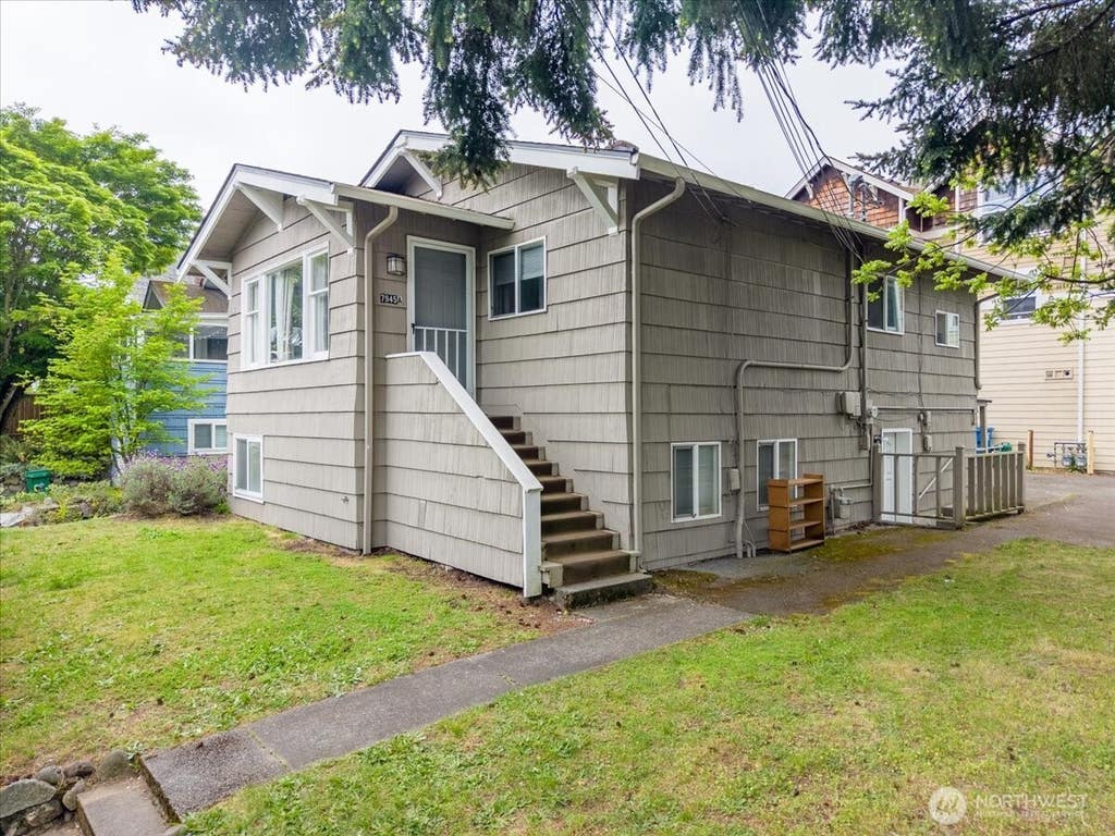 Photo of 7945 9th Avenue SW, Seattle, WA 98106 (MLS # 2543498)