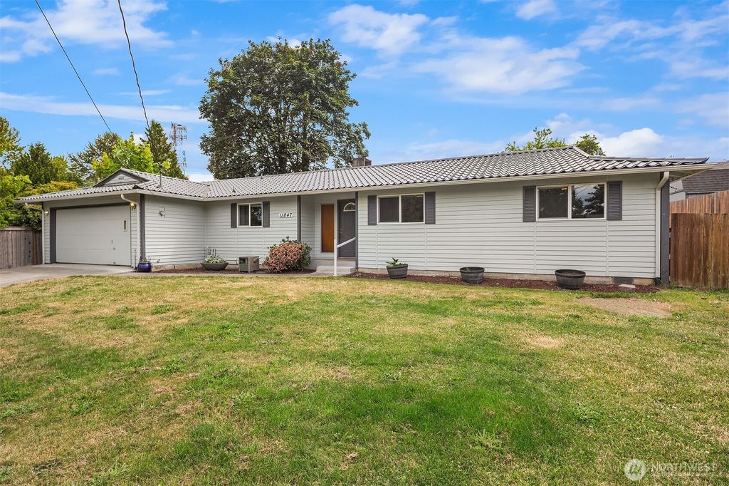 Photo of 11847 SE 227th Place, Kent, WA 98031 (MLS # 2386088)