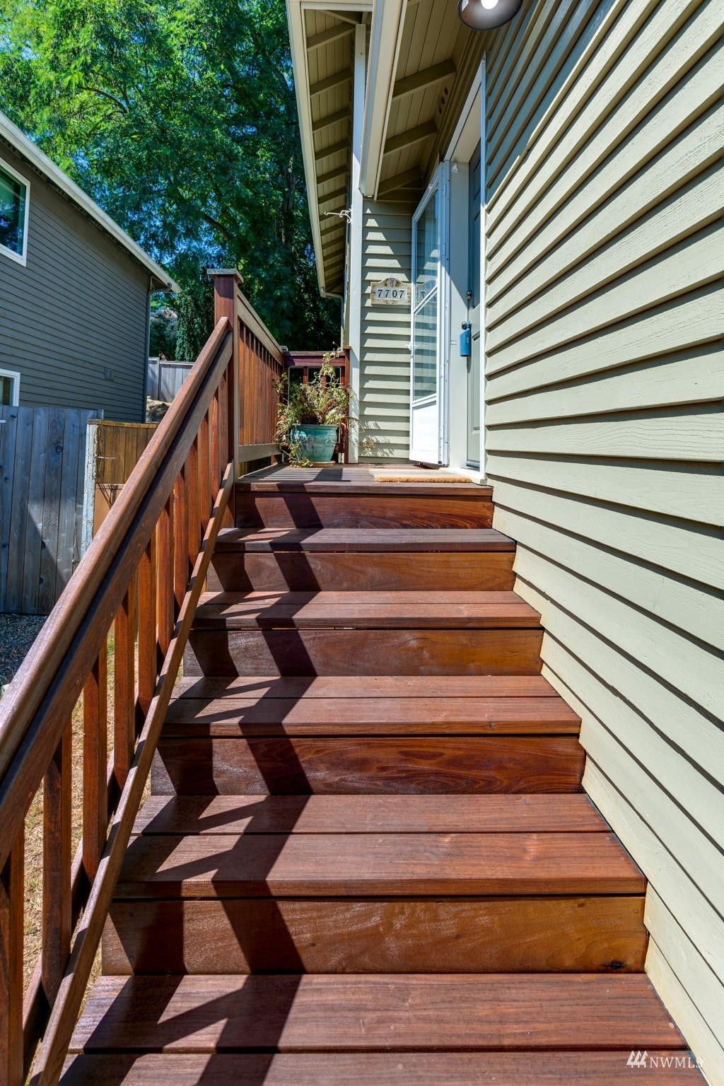 Photo of 7707 27th Avenue SW, Seattle, WA 98126 (MLS # 1992701)