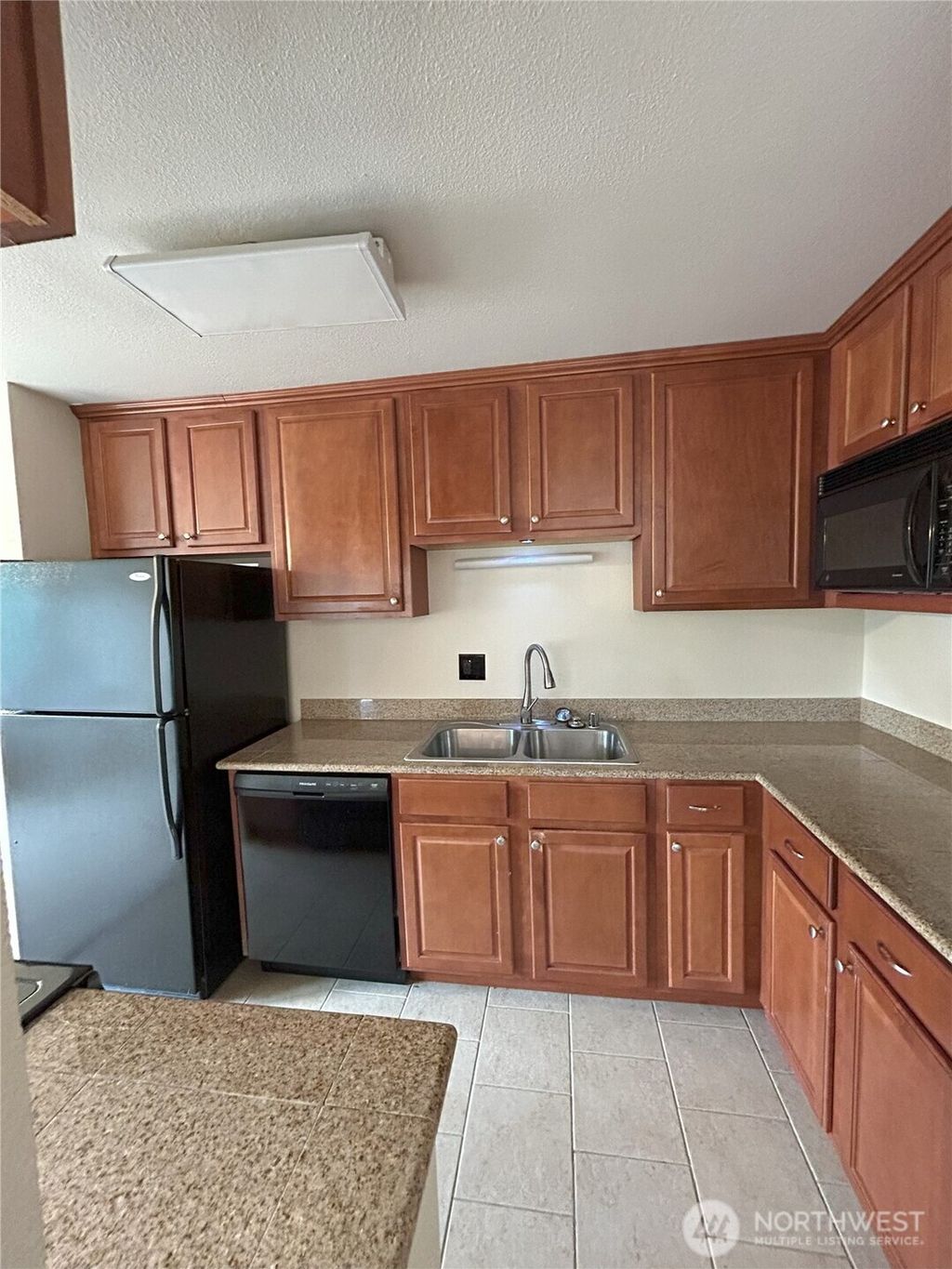 Photo of 20318 Bothell Everett Highway #A303, Bothell, WA 98012 (MLS # 2427730)