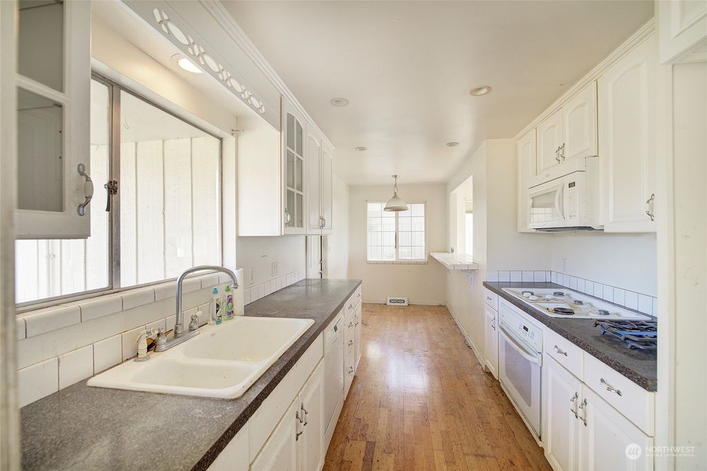 Photo of 2310 NW 90th Street, Seattle, WA 98117 (MLS # 2156086)