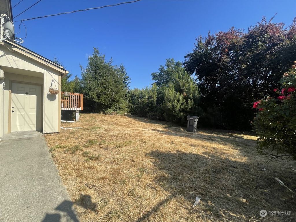 Photo of 11032 26th Avenue SW, Seattle, WA 98146 (MLS # 2144588)