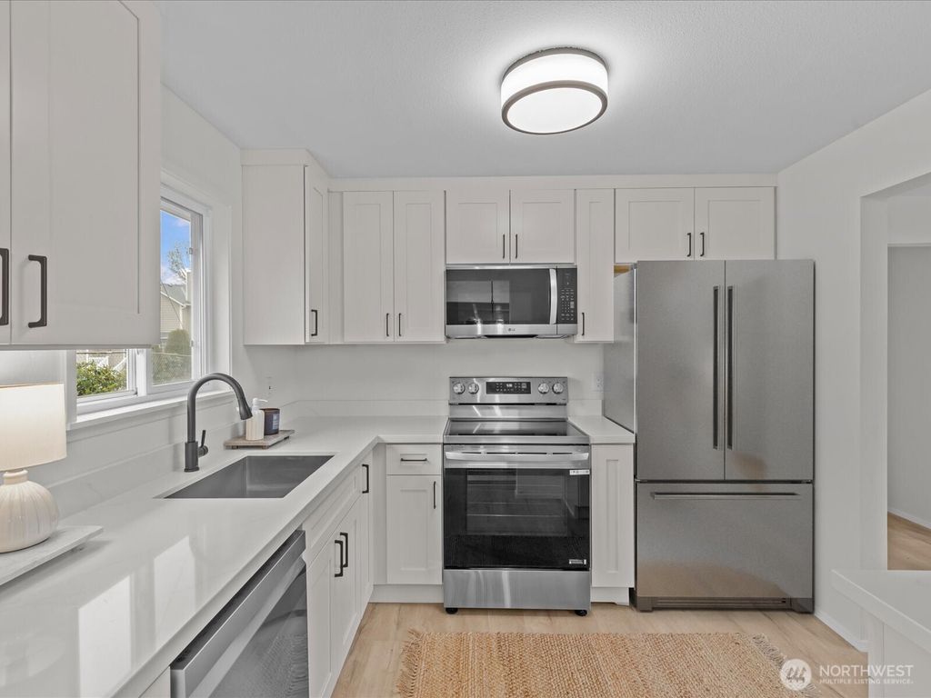 Photo of 20405 119th Avenue SE, Kent, WA 98031 (MLS # 2495114)