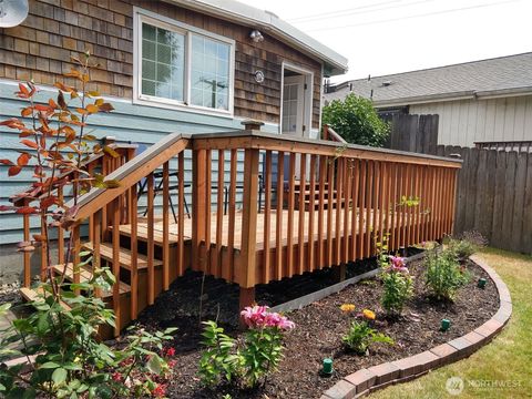 Photo of 7768 14th Avenue SW, Seattle, WA 98106 (MLS # 2542012)