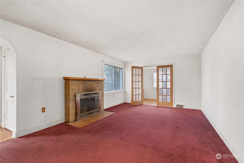 Photo of 3625 NE 143rd Street, Seattle, WA 98125 (MLS # 2051343)