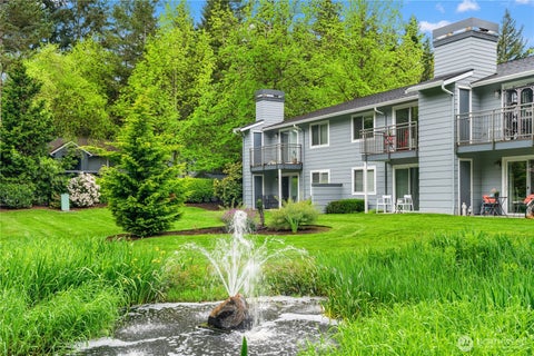 Photo of 12618 100th Lane NE #J248, Kirkland, WA 98034 (MLS # 2578333)