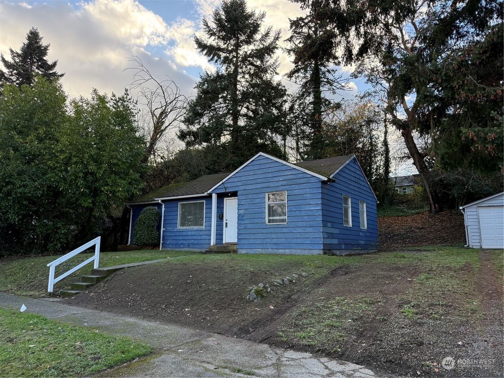 Photo of 9825 32nd Avenue SW, Seattle, WA 98126 (MLS # 2310386)