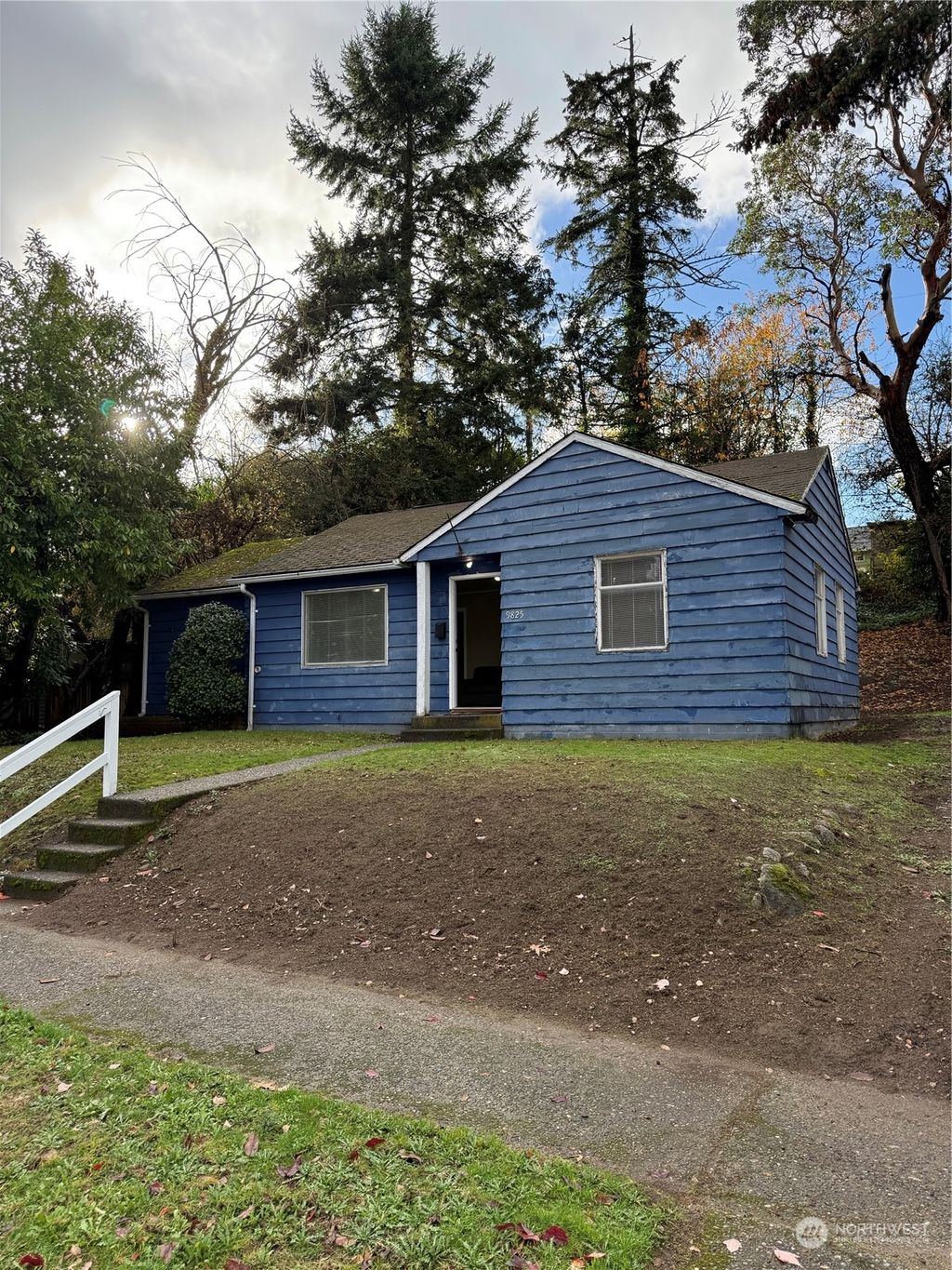 Photo of 9825 32nd Avenue SW, Seattle, WA 98126 (MLS # 2310386)