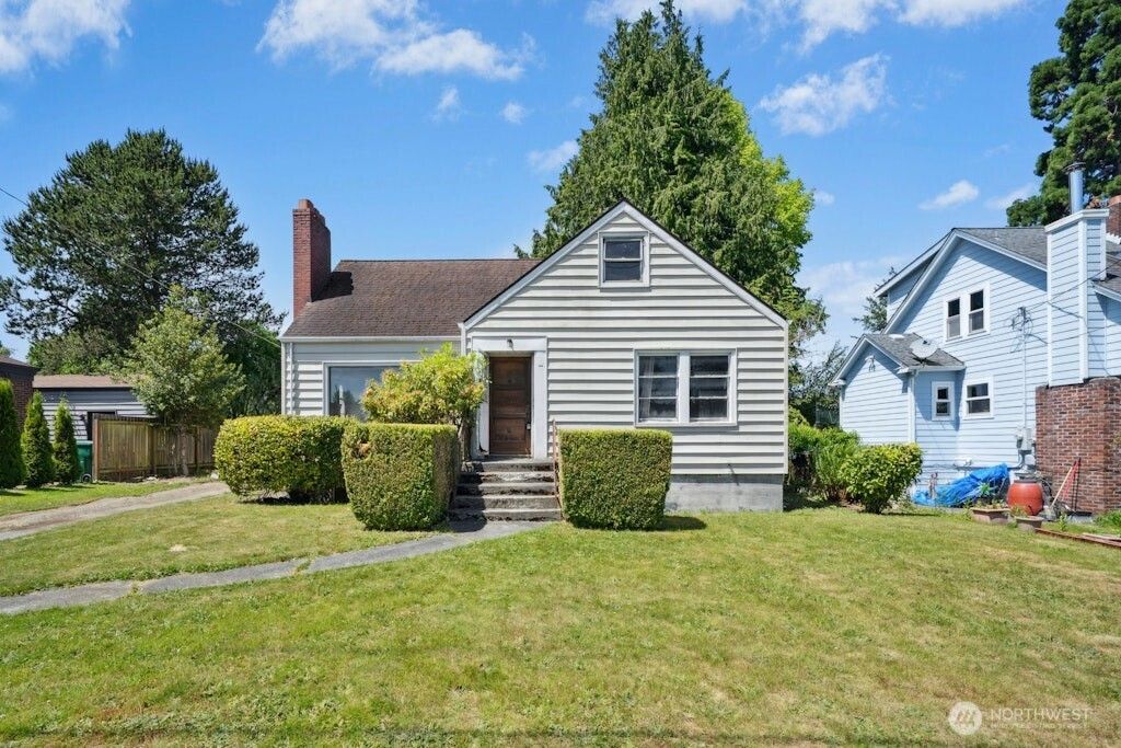 Photo of 8711 28th Avenue NW, Seattle, WA 98117 (MLS # 2377718)