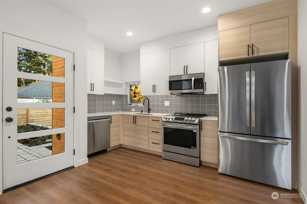 Photo of 12521 12th Avenue NE #B, Seattle, WA 98125 (MLS # 2213467)