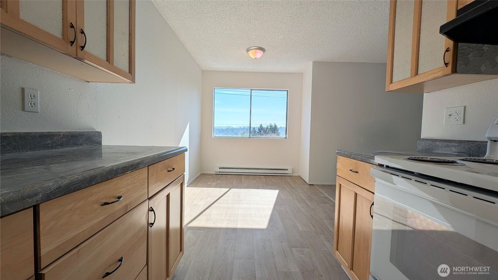 Photo of 10459 Des MoinesMemorial Drive S #N-301, Seattle, WA 98168 (MLS # 2403342)