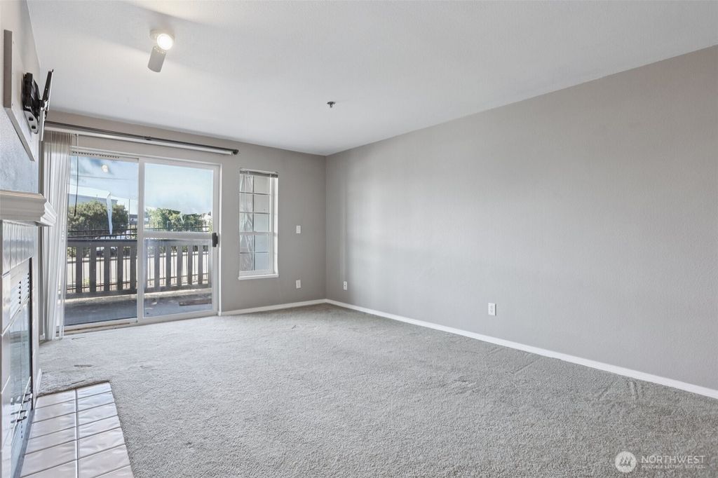 Photo of 215 100th Street SW #A108, Everett, WA 98204 (MLS # 2406632)