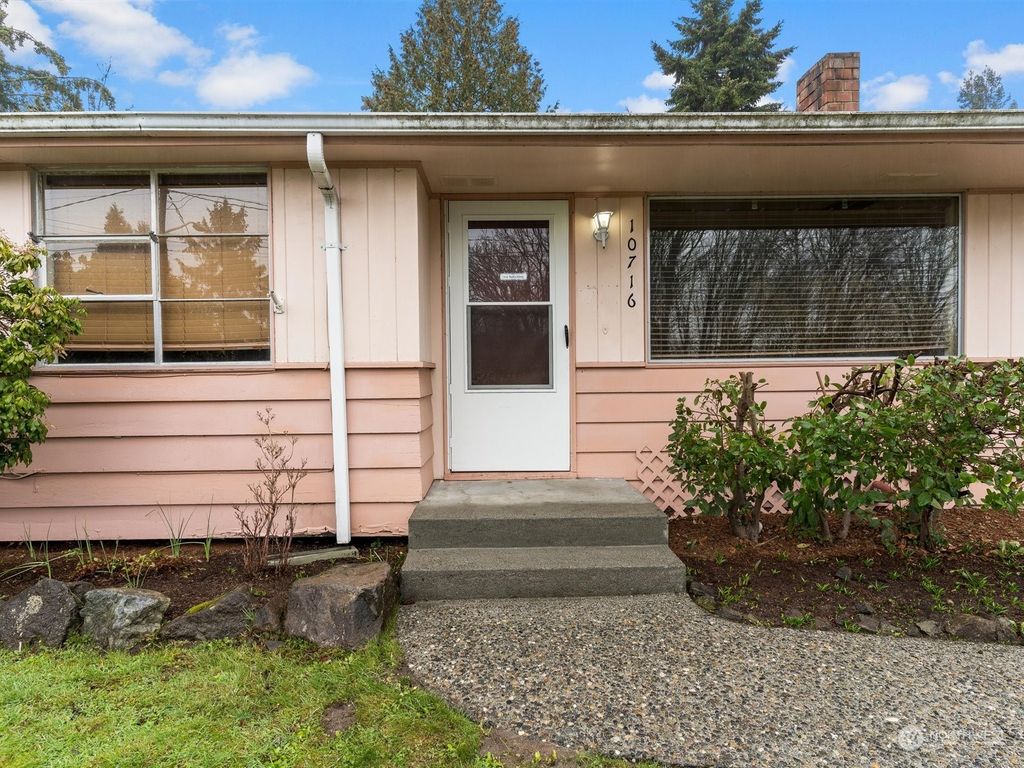 Photo of 10716 4th Avenue NW, Seattle, WA 98177 (MLS # 2033018)