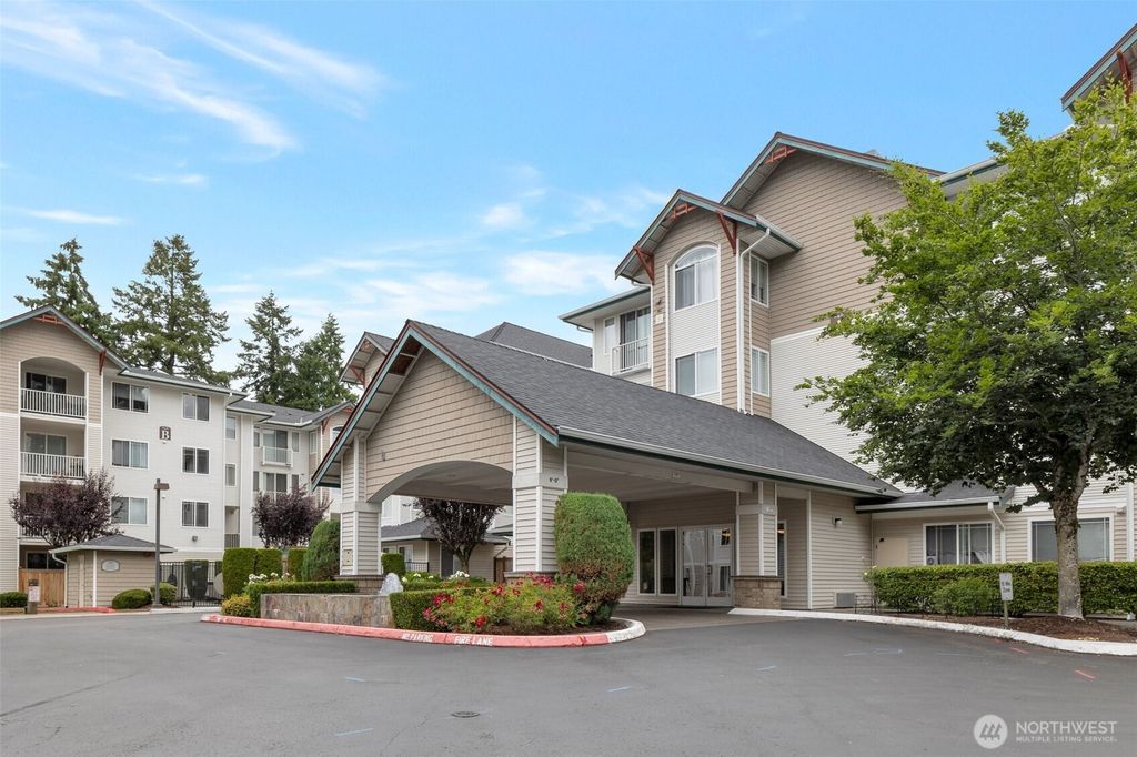 Photo of 13301 SE 79th Place #B-402, Newcastle, WA 98059 (MLS # 2468694)